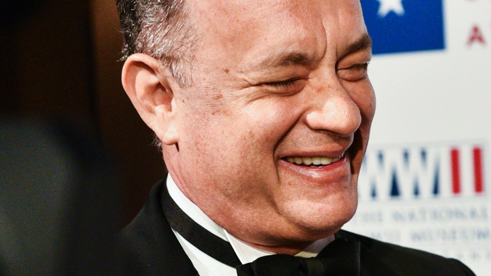 Tom Hanks smiles on the red carpet held at Cipriani on Wall Street, N.Y., for the WWII Museum, where Tom Brokaw and Tom Hanks received the Spirit Award, Feb. 24, 2015. (Photo by Sean Zanni/Patrick McMullan)