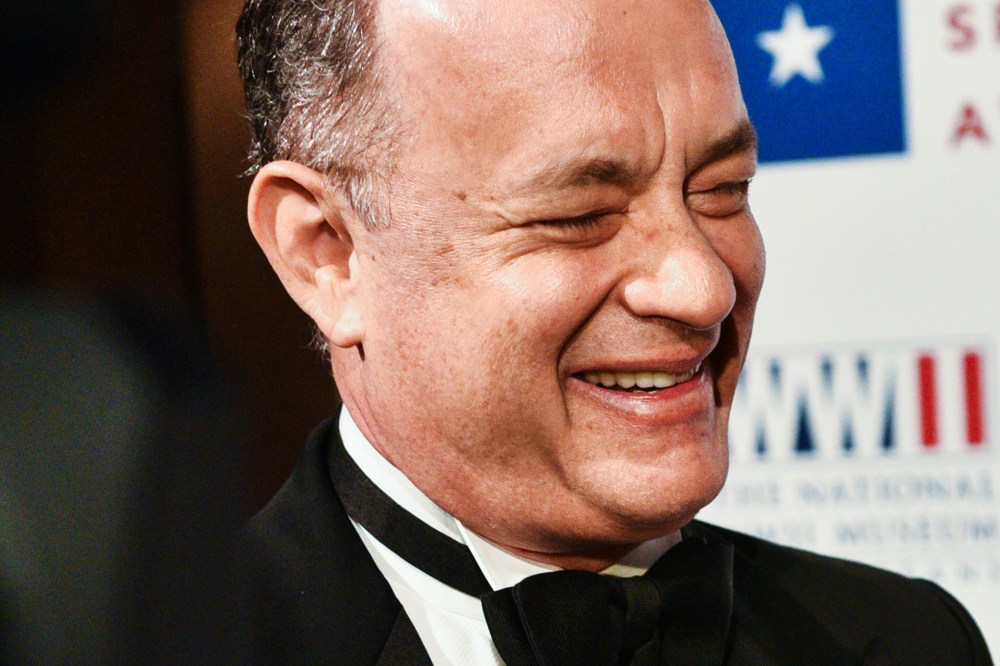 Tom Hanks smiles on the red carpet held at Cipriani on Wall Street, N.Y., for the WWII Museum, where Tom Brokaw and Tom Hanks received the Spirit Award, Feb. 24, 2015. (Photo by Sean Zanni/Patrick McMullan)