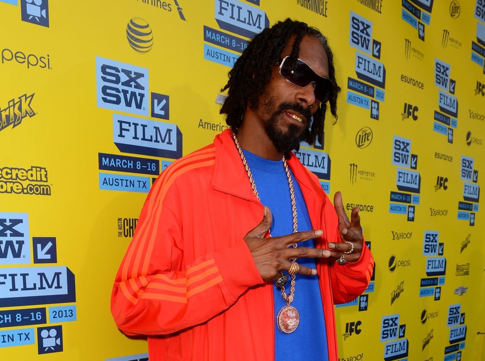 AUSTIN, TX - MARCH 14: Rap and Reggae artist Snoop Lion attends the 'Reincarnated' Red Carpet Arrivals at the 2013 SXSW Music, Film + Interactive Festival held at the Paramount Theatre on March 14, 2013 in Austin, Texas. (Photo by Mark Davis/Getty...