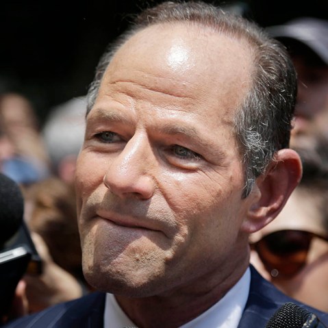 Former New York Gov. Eliot Spitzer is surrounded by media as he tries to collect signatures for his run for New York City Comptroller in New York, Monday, July 8, 2013. (Photo by Seth Wenig/AP)
