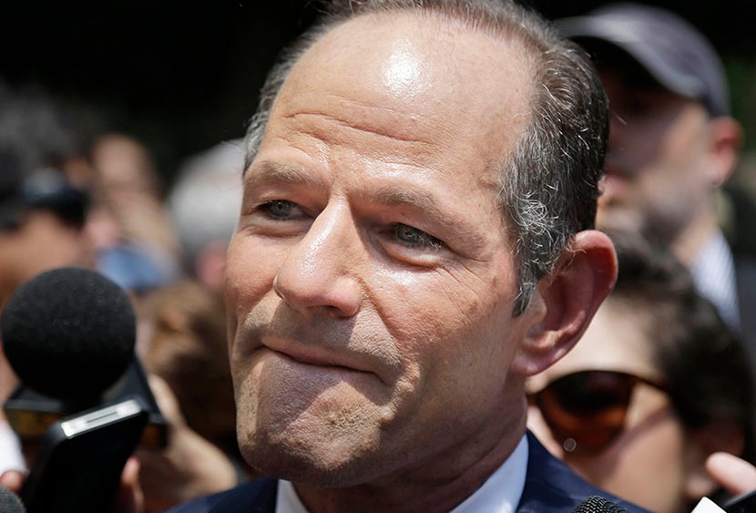 Former New York Gov. Eliot Spitzer is surrounded by media as he tries to collect signatures for his run for New York City Comptroller in New York, Monday, July 8, 2013. (Photo by Seth Wenig/AP)