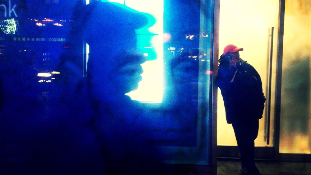 Man talks on his phone, New York, N.Y.