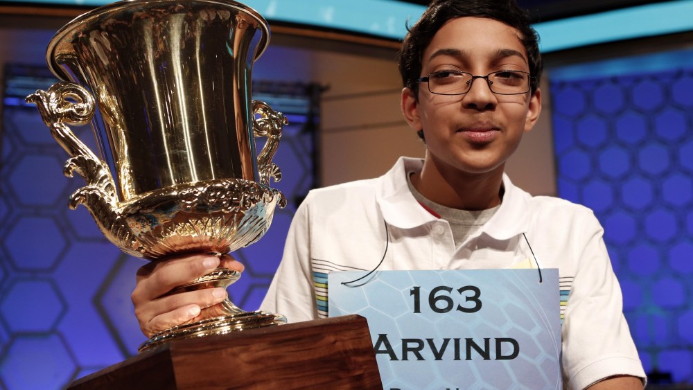 Arvind Mahankali of New York holds his trophy after winning the Scripps National Spelling Bee May 30, 2013. Mahankali, a 13-year-old from Bayside Hills, New York, won the Scripps National Spelling Bee on Thursday. REUTERS/Kevin Lamarque  (UNITED STATES