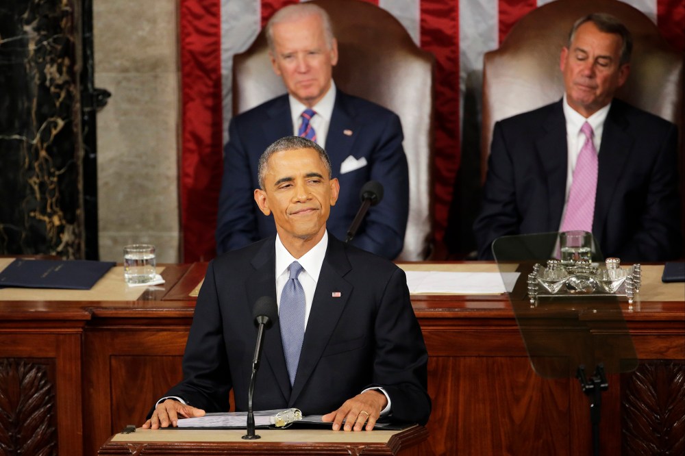 President Barack Obama pauses during his State of the Union address before a joint session of Congress on Capitol Hill in Washington, D.C., Jan. 20, 2015. (Photo by J. Scott Applewhite/AP)