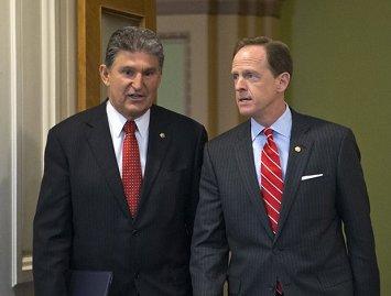Sens. Joe Manchin (D-W.Va.) and Pat Toomey (R-Pa.)