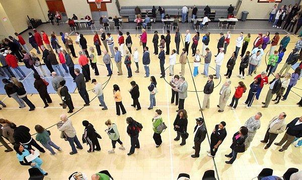 Obama follows through on voting commission