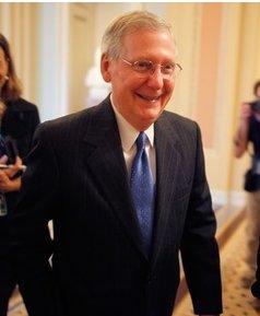 Giving up on creating a health care plan makes Mitch McConnell smile.