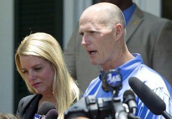 Florida Attorney General Pam Bondi and Gov. Rick Scott