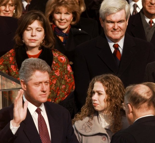 President Clinton is sworn in for his second term by Supreme Court Chief Justice William Rehnquist during the 53rd Presidential Inauguration Monday, Jan. 20, 1997, in Washington.  House Speaker Newt Gingrich and his second wife Marianne are in the...