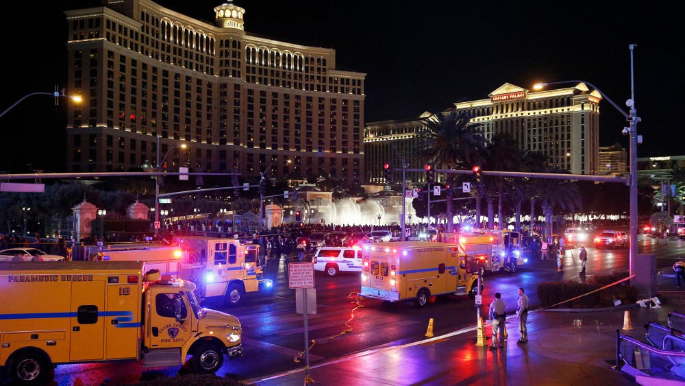 Police and emergency crews respond to the scene of a car accident along Las Vegas Boulevard, Dec. 20, 2015, in Las Vegas, Nev. (Photo by John Locher/AP)