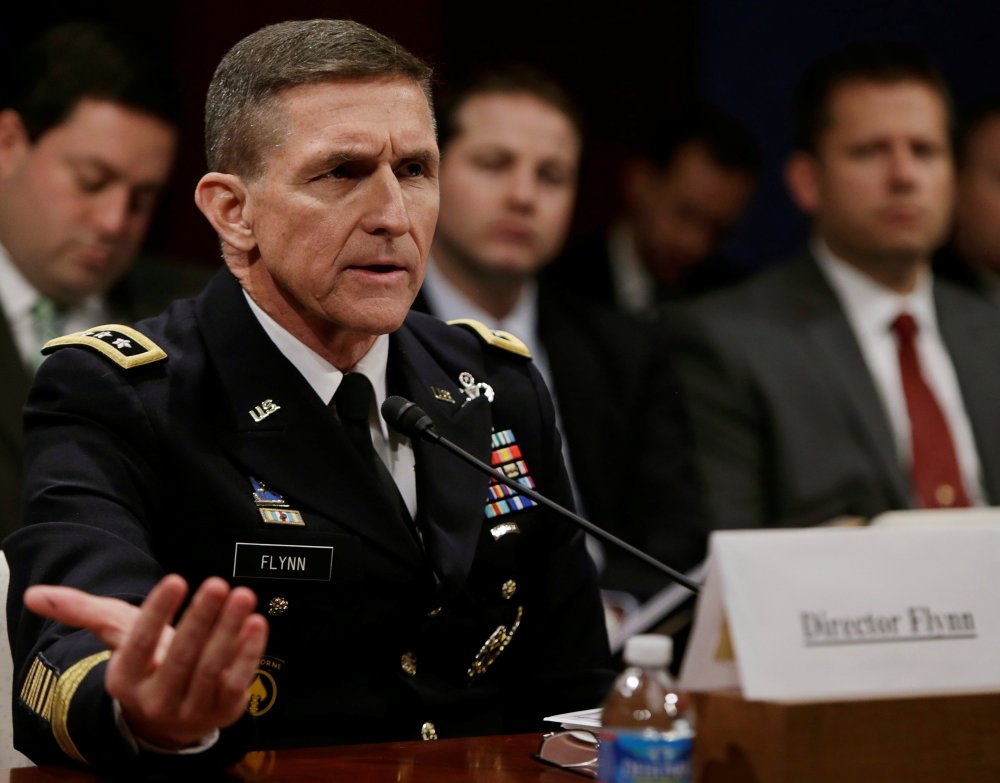 Defense Intelligence Agency director U.S. Army Lt. General Michael Flynn testifies before the House Intelligence Committee on "Worldwide Threats" in Washington February 4, 2014.
