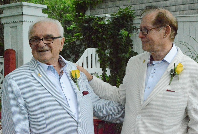 Ted-Larry Pebworth (left ) with husband Claude Summers at their wedding on June 27th.  (Courtesy of Dan McKeon)