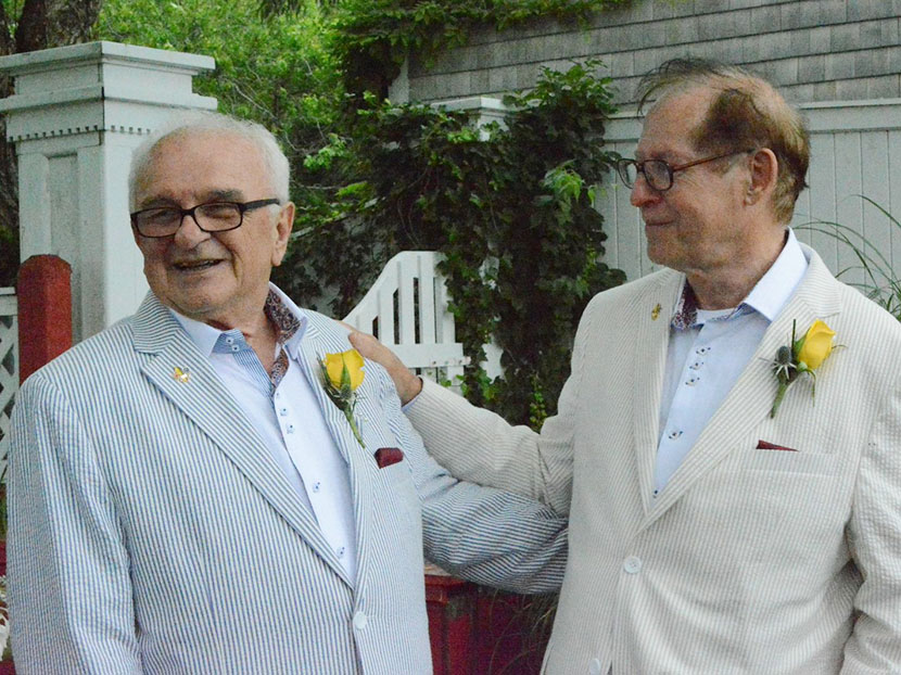 Ted-Larry Pebworth (left ) with husband Claude Summers at their wedding on June 27th. (Courtesy of Dan McKeon)