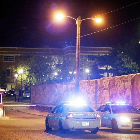 Police guard the main entrance to Tennessee State University, Oct. 23, 2015, while officials investigate the scene of a Thursday shooting on the campus in Nashville, Tenn. (Photo by Mark Humphrey/AP)