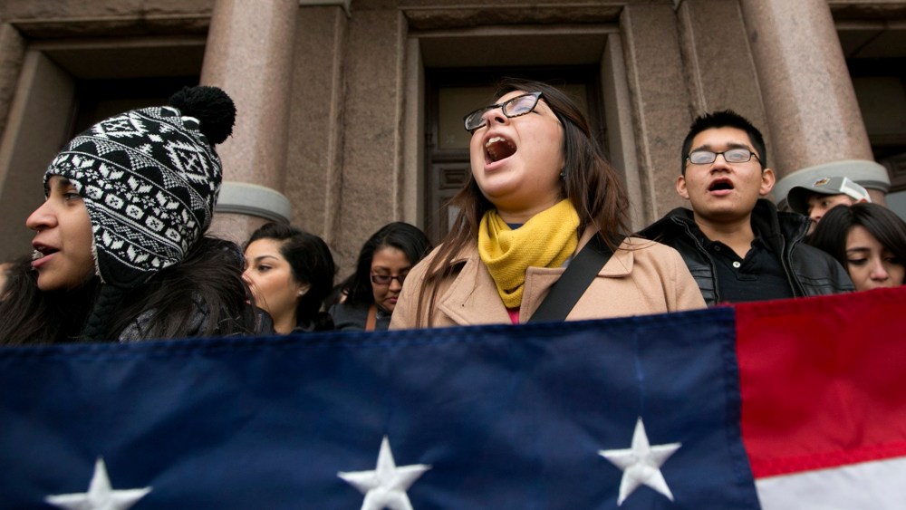 Maria Yolisma Garcia, 20, of Dallas rallies in support of the HB1403, the Texas DREAM Act, at a demonstration at the Capitol in Austin, Texas on Jan. 14, 2015. (Photo by Jay Janner/Austin American-Statesman/AP)