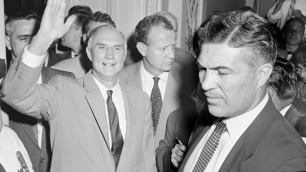 Sen. Strom Thurmond, D-SC, gives a wave as he leaves the Senate chamber, August 29, 1957 at end of his 24 hour, 19 minute one-man filibuster against the compromise civil rights bills.