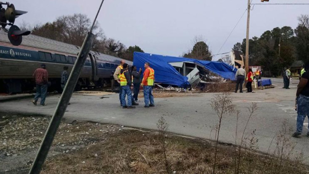 An Amtrak train derails in North Carolina after colliding with a truck. (Photo by Lance Martin via RRSpin)