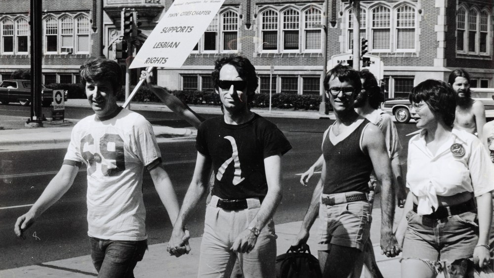 Jack Baker and Michael McConnell, the first same-sex married couple in Minnesota, participate in a Pride Parade in Minneapolis, 1974. (Courtesy of the Jean-Nickolaus Tretter Collection in GLBT Studies/University of Minnesota Libraries)