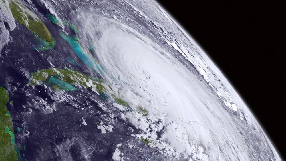 An already colossal Hurricane Joaquin swirls in this satellite image taken Oct. 1, 2015 at 8 a.m. EDT. (Photo by NOAA/AP)