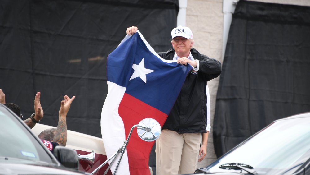 Image: TOPSHOT-US-WEATHER-STORM-TRUMP