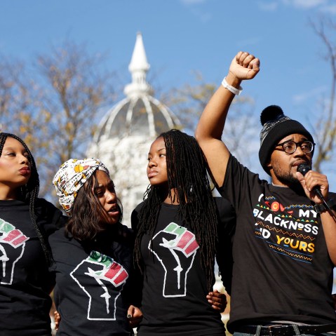 Concerned Student 1950, led by University of Missouri graduate student Jonathan Butler, second from right, speaks following the announcement that University of Missouri System President Tim Wolfe would resign, Nov. 9, 2015, in Columbia, Mo.