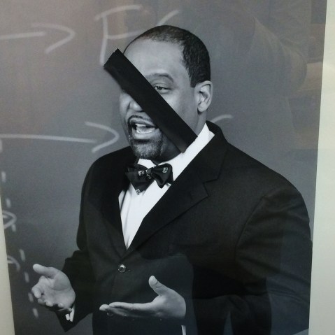 This photo taken by a Kidist Keaton, a 3rd year student at the university, shows a defaced portrait of a black faculty member of Harvard Law School. (Photo by Kidist Keaton)