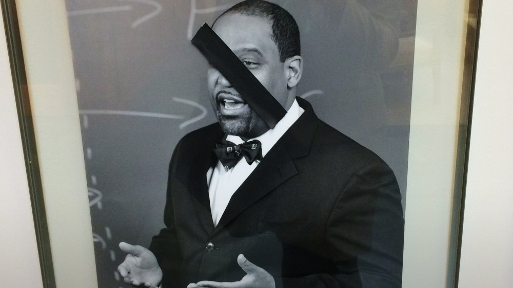 This photo taken by a Kidist Keaton, a 3rd year student at the university, shows a defaced portrait of a black faculty member of Harvard Law School. (Photo by Kidist Keaton)