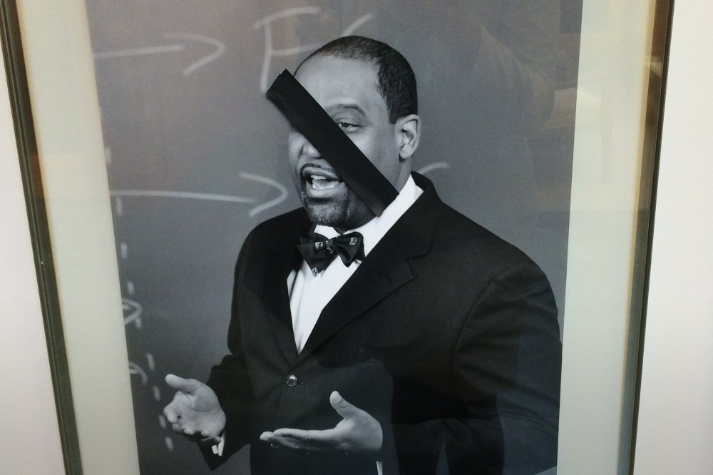 This photo taken by a Kidist Keaton, a 3rd year student at the university, shows a defaced portrait of a black faculty member of Harvard Law School. (Photo by Kidist Keaton)