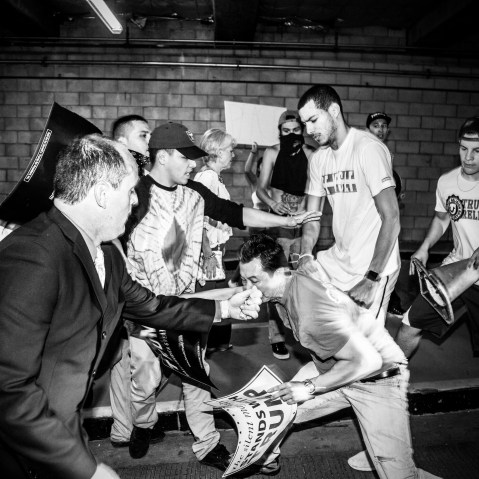 Donald Trump protesters and supporters clash inside a parking lot near Trump's election rally in San Jose, Calif., June 2, 2016. (Photo by Mark Peterson/Redux for MSNBC)