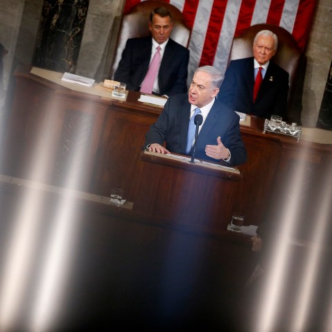 The lights of the House Chamber are reflected in the railing that surrounds the chamber on Capitol Hill in Washington, on March 3, 2015, as Israeli Prime Minister Benjamin Netanyahu speaks before a joint meeting of Congress.