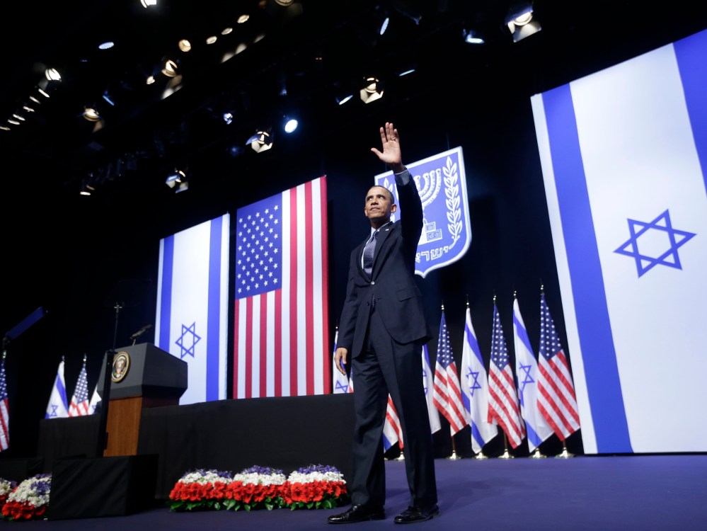 President Barack Obama waves to the crowd after speaking at the Jerusalem Convention Center in Jerusalem, Israel, Thursday, March 21, 2013.  (Photo by Pablo Martinez Monsivais/AP Photo)