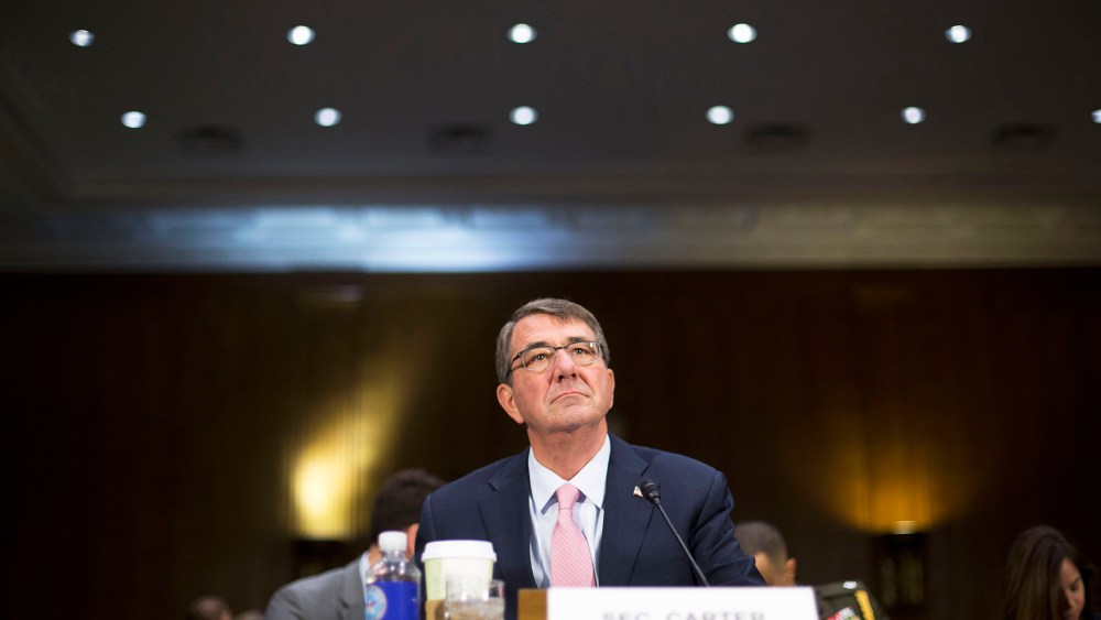 Defense Secretary Ash Carter arrives on Capitol Hill in Washington, D.C., Dec. 9, 2015, to testify before the Senate Armed Service Committee hearing on the Islamic State. (Photo by Pablo Martinez Monsivais/AP)