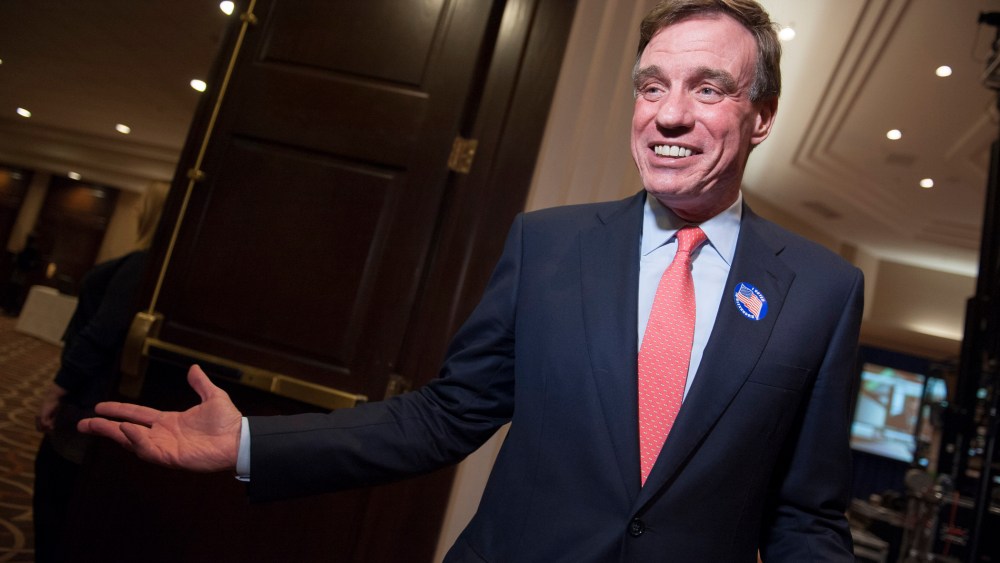 Sen. Mark Warner, D-Va., arrives at the Virginia Democratic "Victory for Virginia" election party, in Tysons Corner, Va., Tuesday, Nov. 5, 2013.