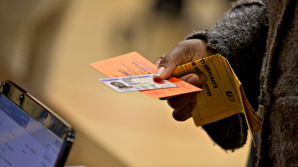 Voter casts a ballot in Fairfax County, Virginia (Photo by J. Scott Applewhite/AP)