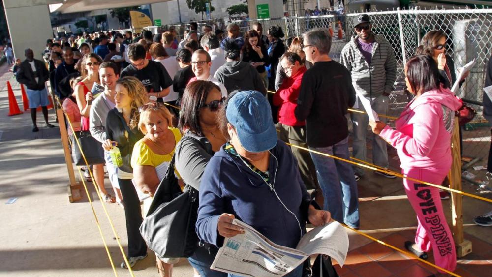 In this Nov. 3, 2012, photo, South Floridians stand in line during the last day of early voting in Miami. (AP Photo/Alan Diaz)