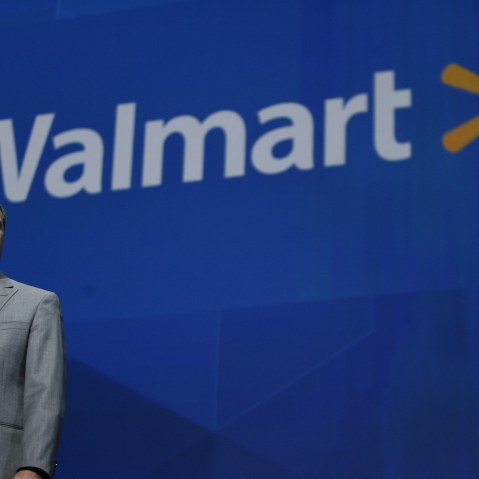 President and CEO, Walmart International Doug McMillan addresses the crowd on Wal-Mart 's 2012 worldwide sales during the Walmart shareholders meeting in Fayetteville, Ark., Friday, June 7, 2013. (AP Photo/Gareth Patterson)
