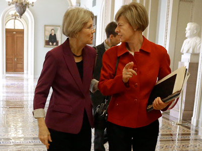 Senator-elect Elizabeth Warren and Senator-elect Tammy Baldwin on Capitol Hill in Washington on Tuesday. (Pablo Martinez Monsivais/AP Photo)