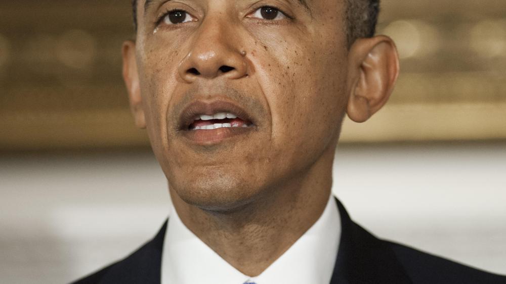President Barack Obama speaks about the deadly tornadoes that hit Oklahoma earlier this week, May 21, 2013. (Photo by: Saul Loeb/AFP/Getty Images).