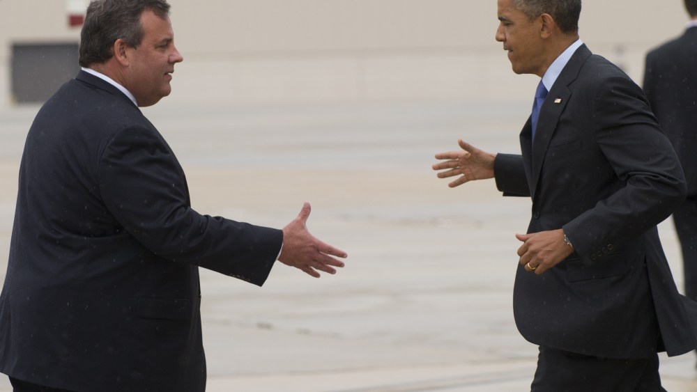 President Barack Obama shakes hands with New Jersey Governor Chris Christie at Joint Base McGuire-Dix in New Jersey on May 28, 2013.