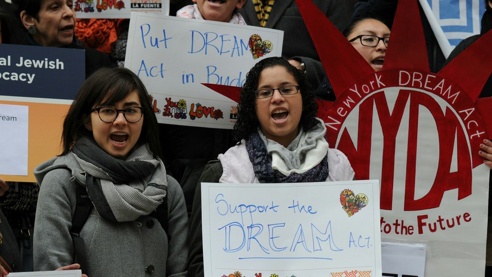 Immigration activists rally on the the steps of the New York Public Library January 13, 2014 in New York.