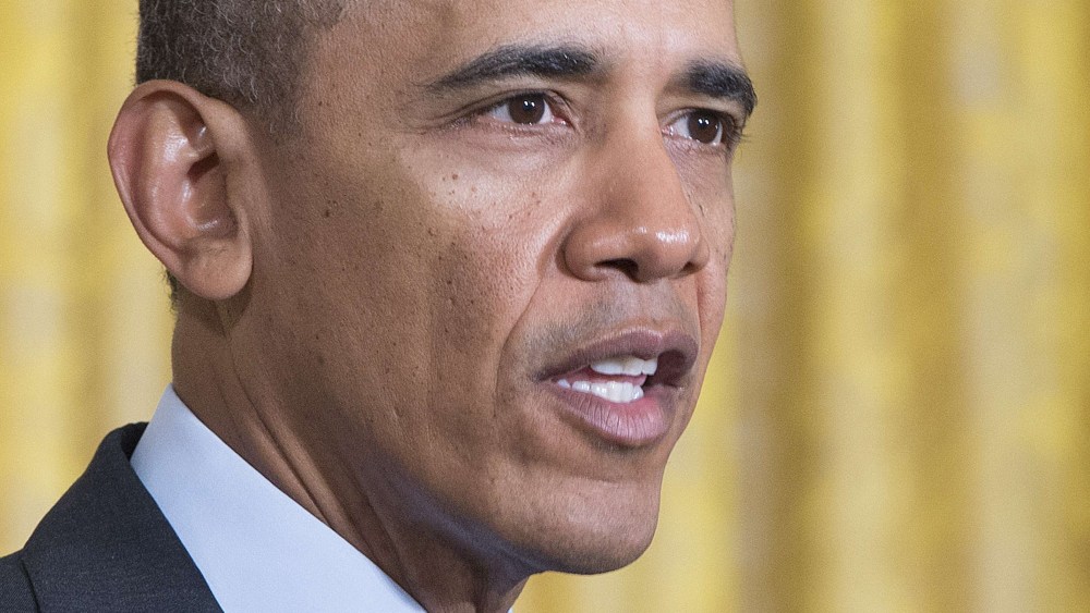 US President Barack Obama speaks before signing a memorandum directing the Federal Government not to discriminate against long-term unemployed job seekers at the White House in Washington, DC, Jan. 31, 2014.