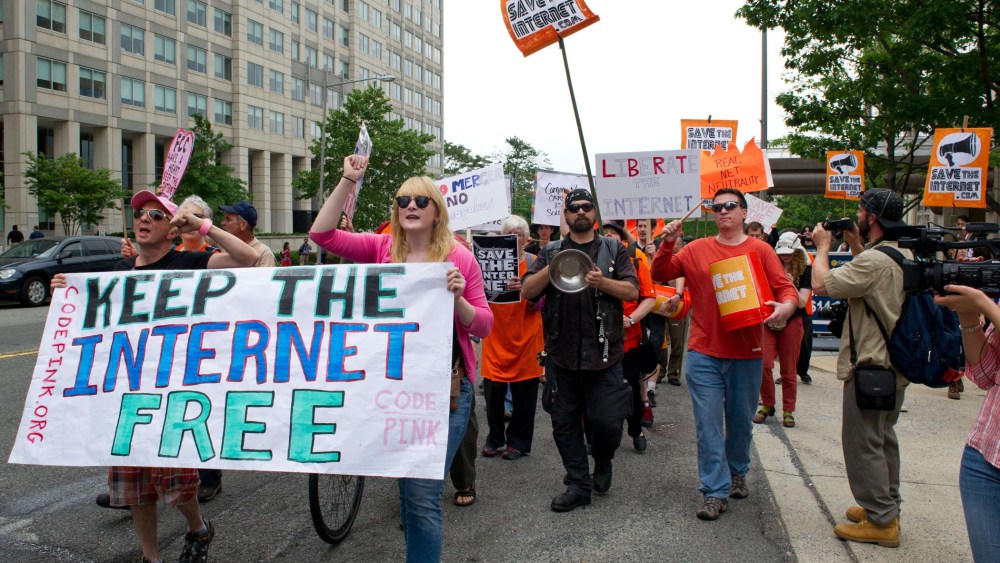 Protesters hold a rally to support "net neutrality" on May 15, 2014 at the FCC in Washington, D.C.