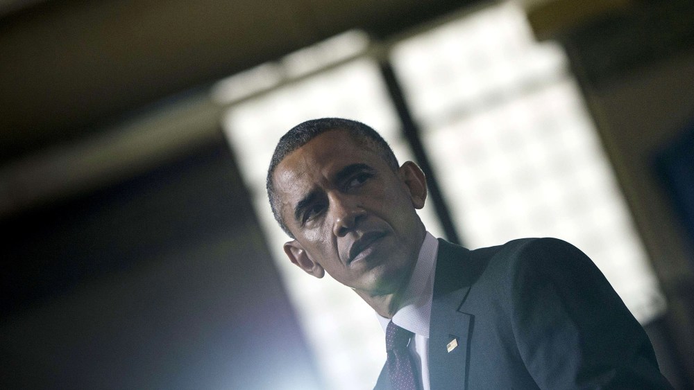 US President Barack Obama pauses while speaking at Rhode Island College Oct. 31, 2014 in Providence, Rhode Island.