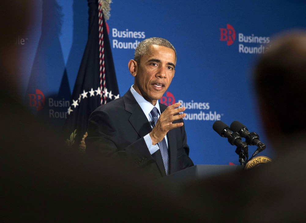 President Barack Obama addresses a group of business leaders at the quarterly meeting of the Business Roundtable in Washington, D.C. on Dec. 3, 2014. (Photo by Nicholas Kamm/AFP/Getty)