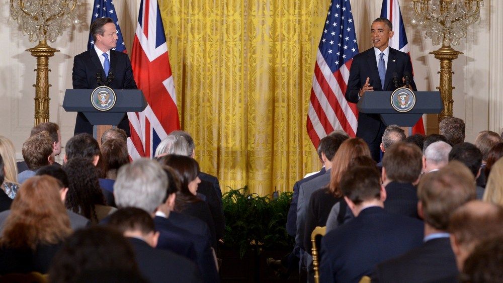 US President Barack Obama (R) and Britain's Prime Minister David Cameron hold a press conference in the East Room of the White House on Jan. 16, 2015, in Washington, DC. (Photo by Mandel Ngan/AFP/Getty)