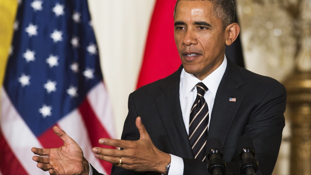 President Barack Obama speaks during a joint press conference with German Chancellor Angela Merkel in the East Room of the White House in Washington, D.C., Feb. 9, 2015. (Photo by Saul Loeb/AFP/Getty)