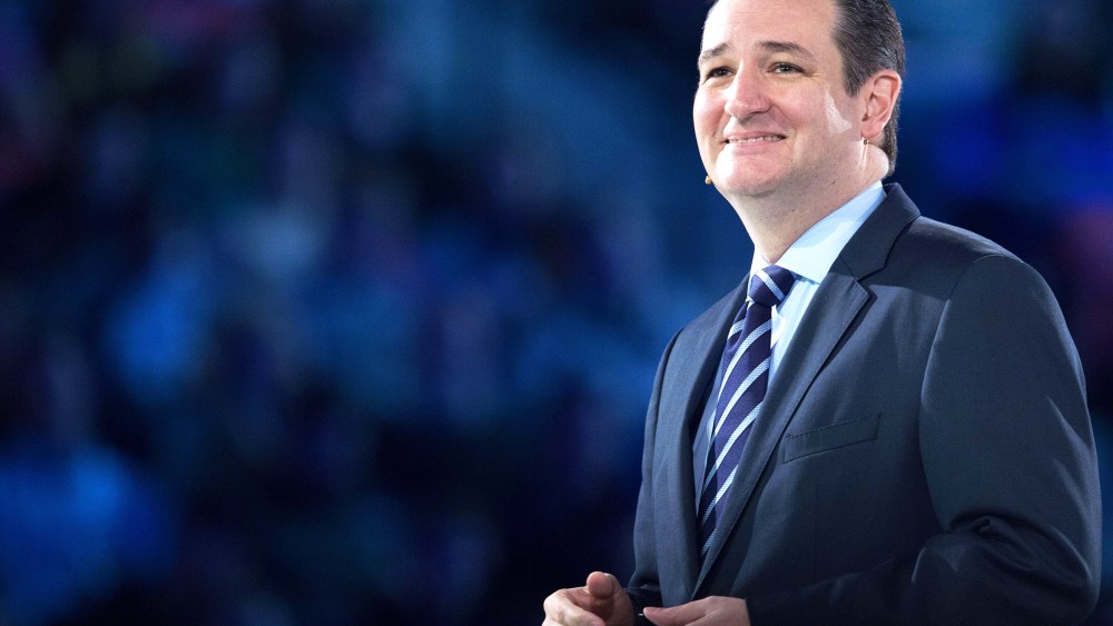 US Senator Ted Cruz (R-TX) smiles at the crowd while delivering remarks announcing his candidacy for the Republican nomination to run for US president March 23, 2015 in Lynchburg, Va. (Photo by Paul J. Richards/AFP/Getty)