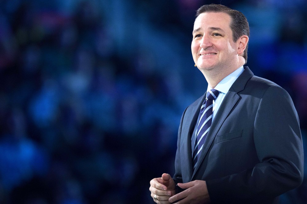 US Senator Ted Cruz (R-TX) smiles at the crowd while delivering remarks announcing his candidacy for the Republican nomination to run for US president March 23, 2015 in Lynchburg, Va. (Photo by Paul J. Richards/AFP/Getty)