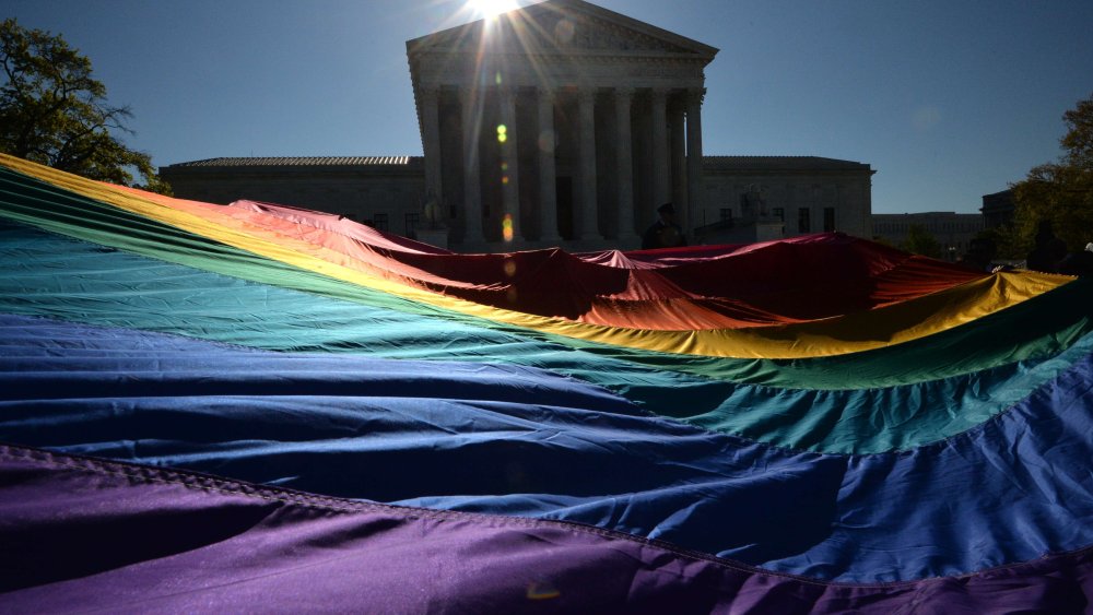 Supporters of same-sex marriages gather outside the US Supreme Court on April 28, 2014 in Washington, DC.