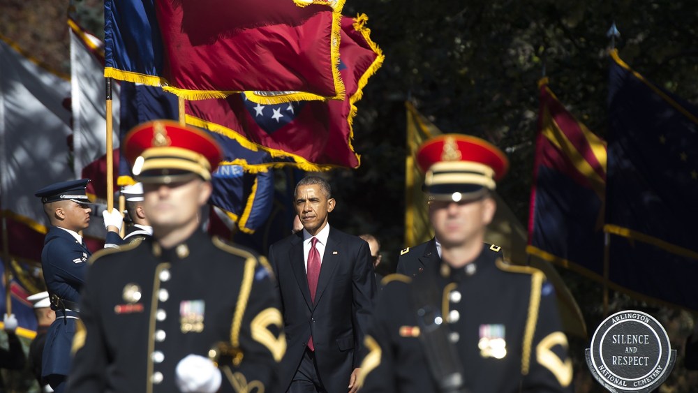 President Barack Obama arrives for a wreath laying ceremony at the Tomb of the Unknown Soldier in honor of Veteran's Day at Arlington National Cemetery in Arlington, Va., on Nov. 11, 2015. (Photo by Saul Loeb/AFP/Getty)